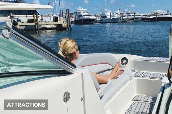 A captain navigates a private boat rental through miami's scenic waterways