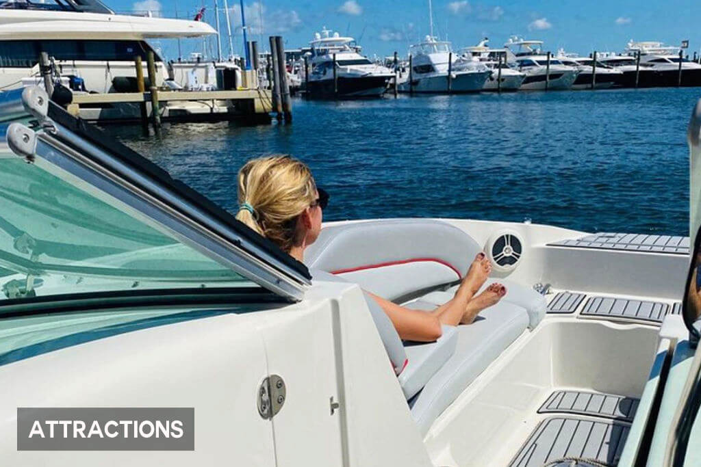 A captain navigates a private boat rental through miami's scenic waterways